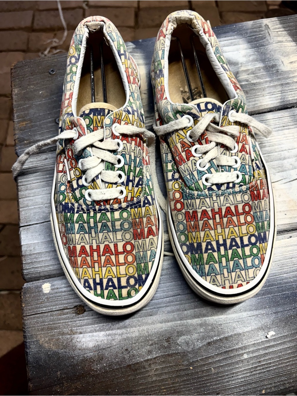 Vans Mahalo Easys with multicolored 'MAHALO' text repeating pattern W9